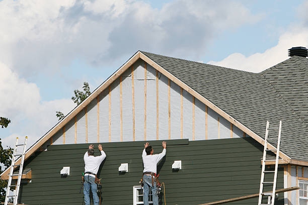 Professional Siding Installation technician working in Seville, OH